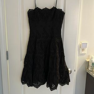 Strapless black eyelet corset dress by BCBG in size 2 Petite